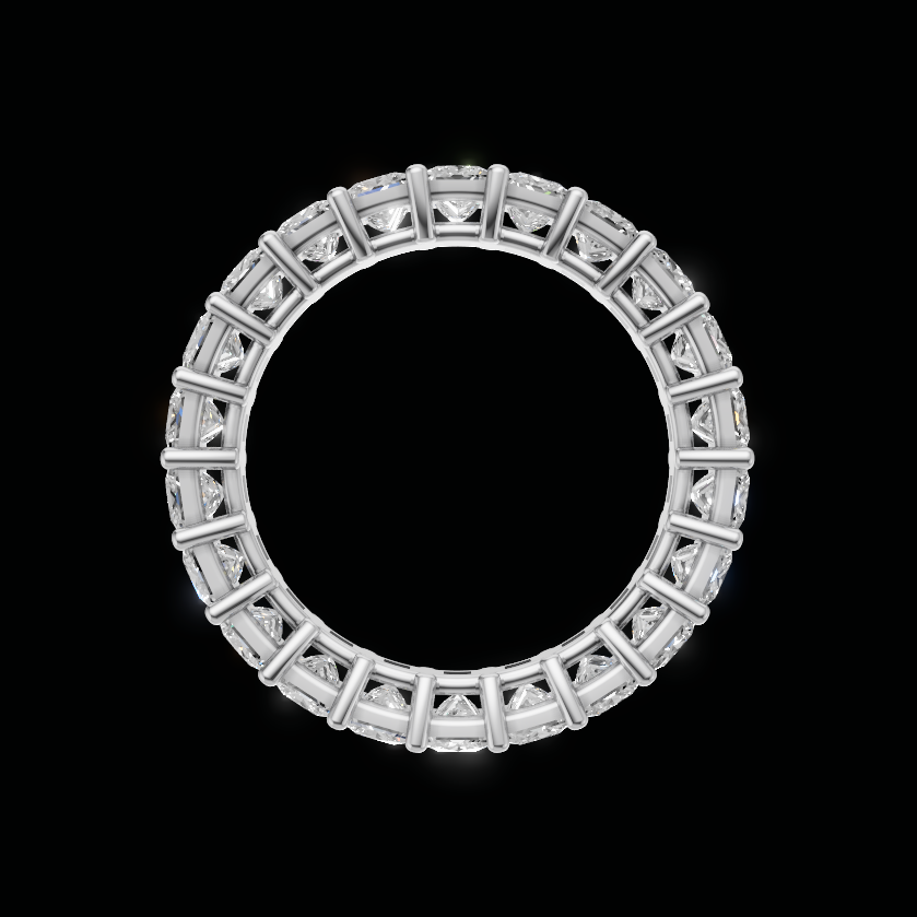 A silver-toned eternity ring featuring a continuous row of square-cut clear gemstones set in a circular shape, presented on a solid black background.