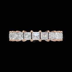 A rose gold eternity ring featuring a row of princess-cut diamonds set in a five-prong band, shown against a solid black background.