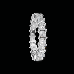 A silver tennis ring featuring a continuous row of princess-cut diamonds, shown on a solid black background.