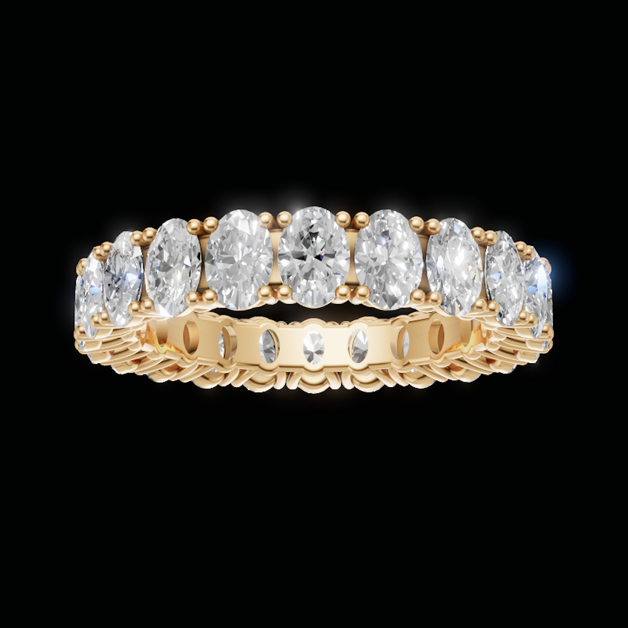 A yellow gold eternity ring featuring a row of oval-cut clear gemstones, set against a solid black background.