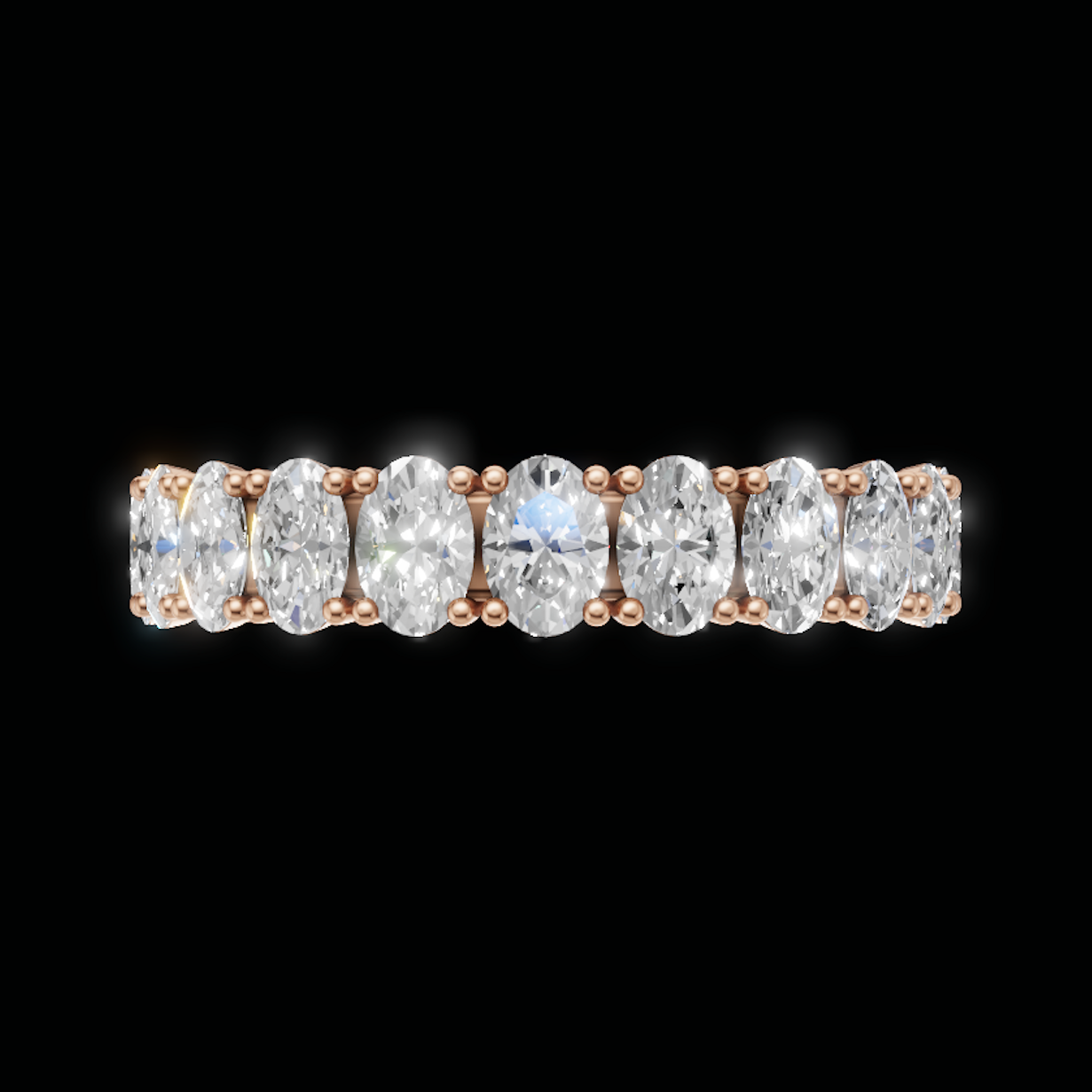 A close-up of a diamond eternity ring featuring six oval-cut diamonds set in a rose gold band, shown against a solid black background.